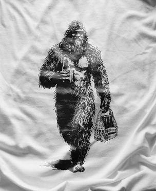 Bigfoot Carrying a Six Pack